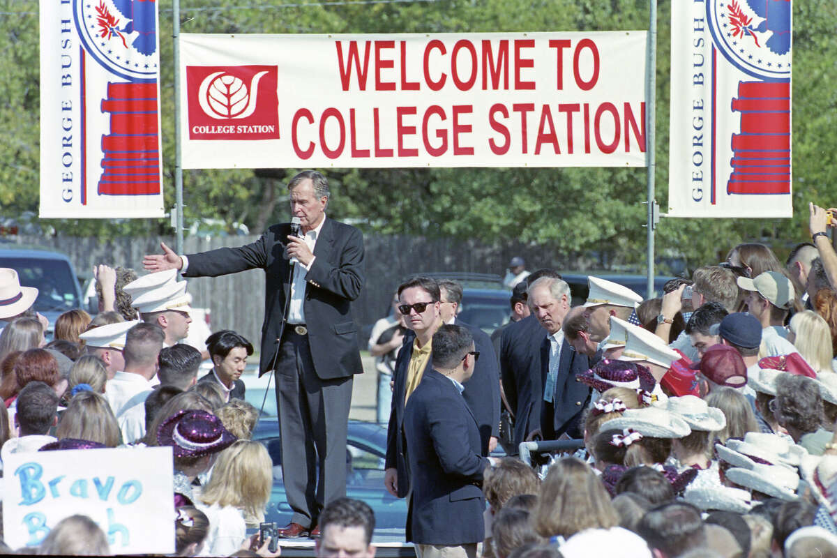 Former President George H.W. Bush speaks to the crowd in College Station that welcomed him and his guests for dedication ceremonies of the George Bush Presidential Library and Museum at Texas A&M University. 