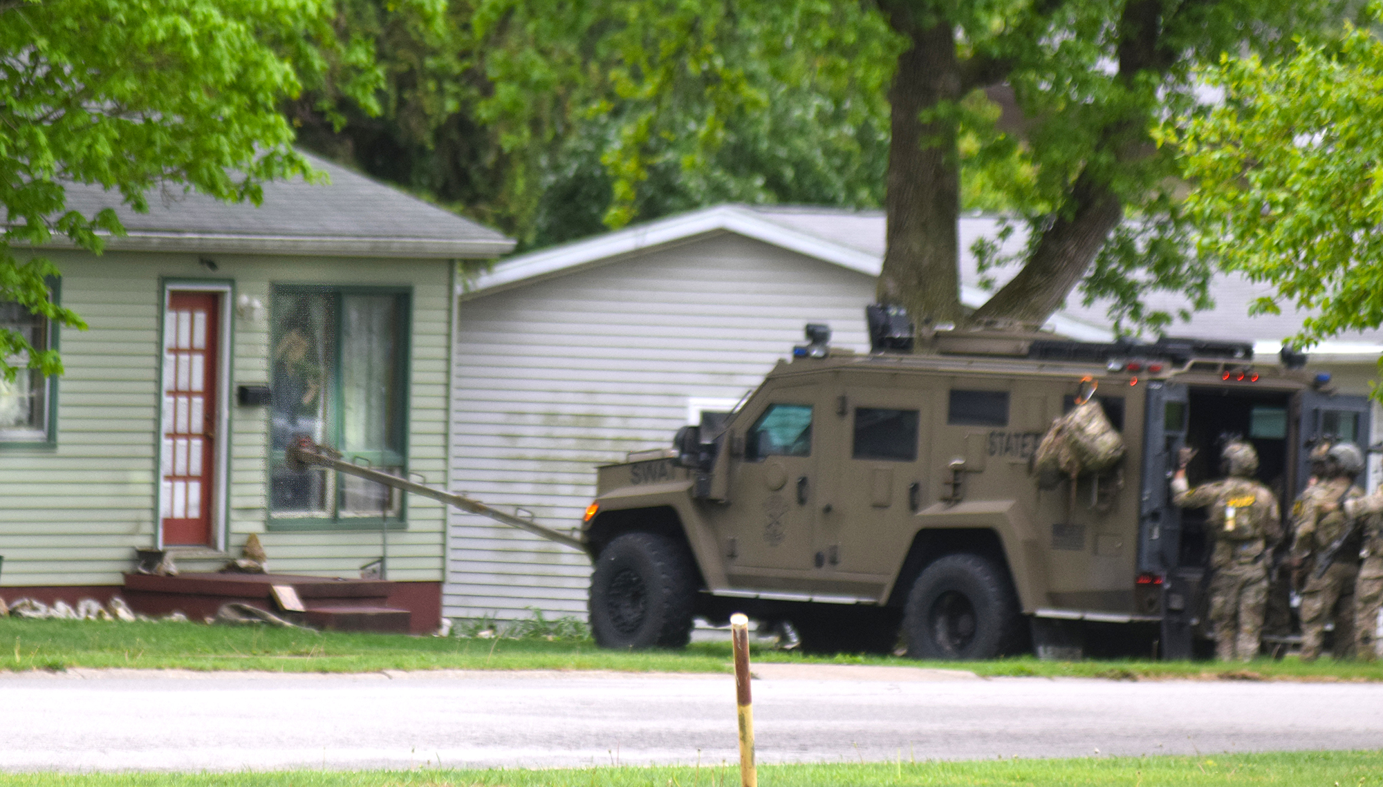 Barricaded man surrenders after hours-long police standoff