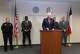 Tarrant County District Attorney Phil Sorrells speaks during a news conference Friday at the Tim Curry Justice Center in Fort Worth flanked by other law enforcement agencies involved in a fraud investigation.