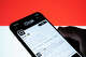 FILE: xAI’s chatbot Grok is displayed on a phone screen.