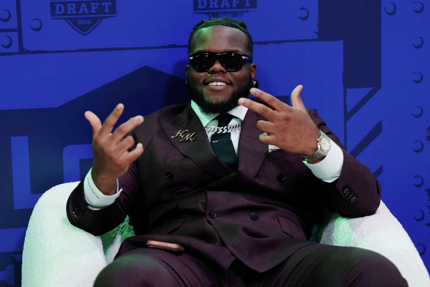 Ohio State defensive lineman Kayden McDonald sits n the green room during the during the first round NFL football draft in Pittsburgh, Thursday, April 23, 2026.