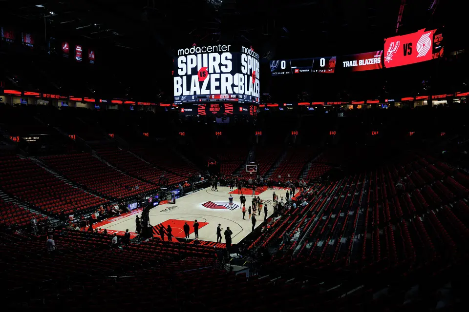 People walk on the court before Game 3 of a first-round NBA playoff series between the Portland Trail Blazers and the San Antonio Spurs at Moda Center in Portland, Friday, April 24, 2026.