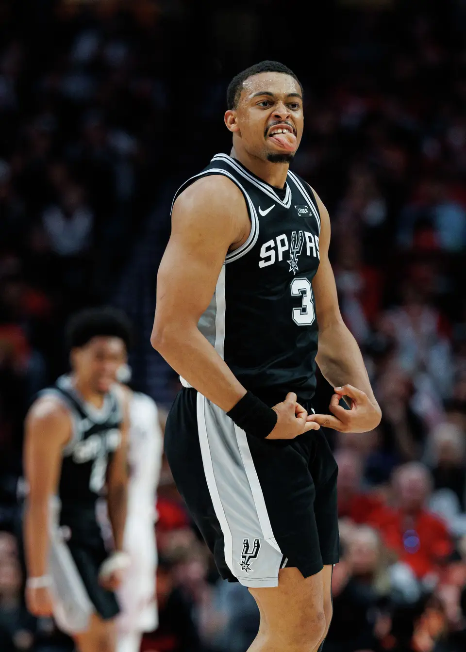 San Antonio Spurs forward Keldon Johnson (3) reacts after making a shot against the Portland Trail Blazers during the third quarter of Game 3 of a first-round NBA playoff series at Moda Center in Portland, Friday, April 24, 2026.