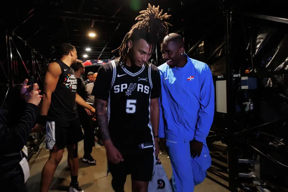 San Antonio Spurs forward David Jones Garcia, right, hypes up San Antonio Spurs guard Stephon Castle as they walk back to the locker following their 120-108 victory over the Portland Trail Blazers in Game 3 of a first-round NBA playoff series at Moda Center in Portland, Saturday, April 25, 2026. Castle had 33 points, two rebounds and 5 assists, which helped lead the Spurs to victory.