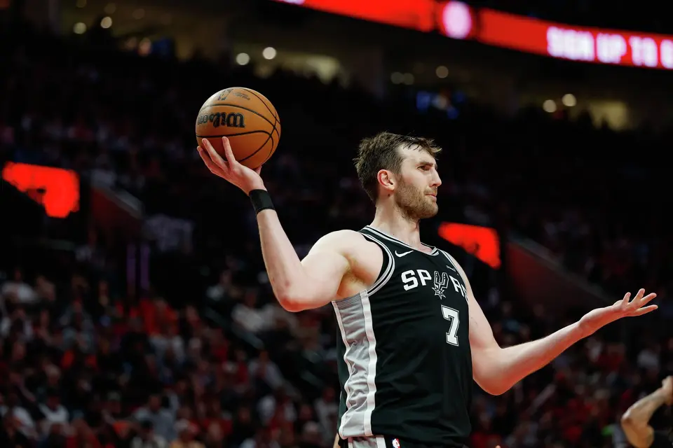 San Antonio Spurs center Luke Kornet (7) reacts after a defensive foul is called on him during the third quarter of Game 3 of a first-round NBA playoff series at Moda Center in Portland, Friday, April 24, 2026.