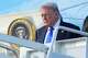 President Donald Trump arrives on Air Force One at Palm Beach International Airport in West Palm Beach Fla., Friday, April 24, 2026.
