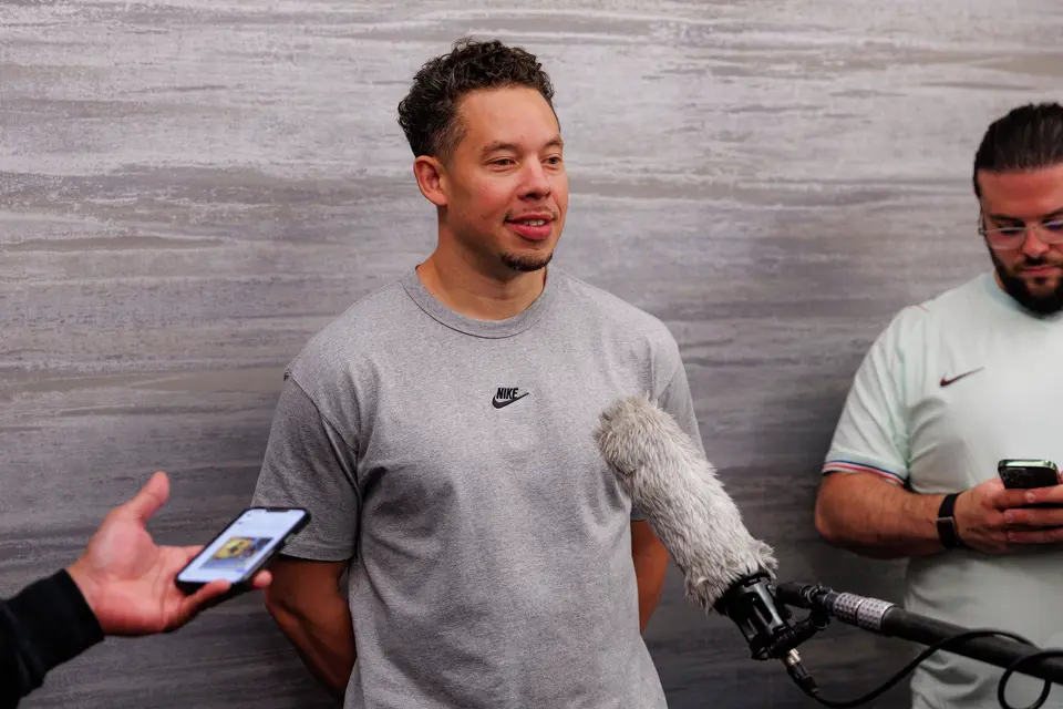 San Antonio Spurs head coach Mitch Johnson speaks with reporters at the team hotel on an off day during a first-round NBA playoff series against the Portland Trail Blazers, Saturday, April 25, 2026, in Portland, Ore. The Spurs face the Trail Blazers in Game 4 on Sunday afternoon.