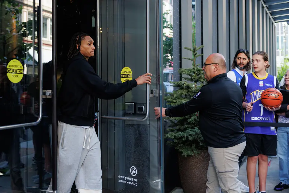 San Antonio Spurs guard Devin Vassell walks out of the team hotel on an off day during a first-round NBA playoff series against the Portland Trail Blazers, Saturday, April 25, 2026, in Portland, Ore. The Spurs face the Trail Blazers in Game 4 on Sunday afternoon.