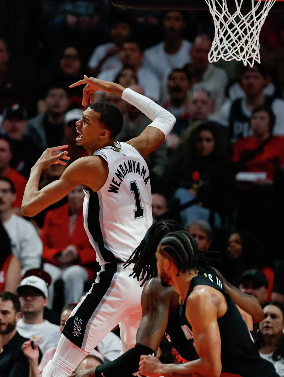 San Antonio Spurs forward Victor Wembanyama (1) reacts to a foul call on the Spurs during the second quarter of Game 4 of a first-round NBA playoff series against the Portland Trail Blazers at Moda Center on Sunday, April 26, 2026.