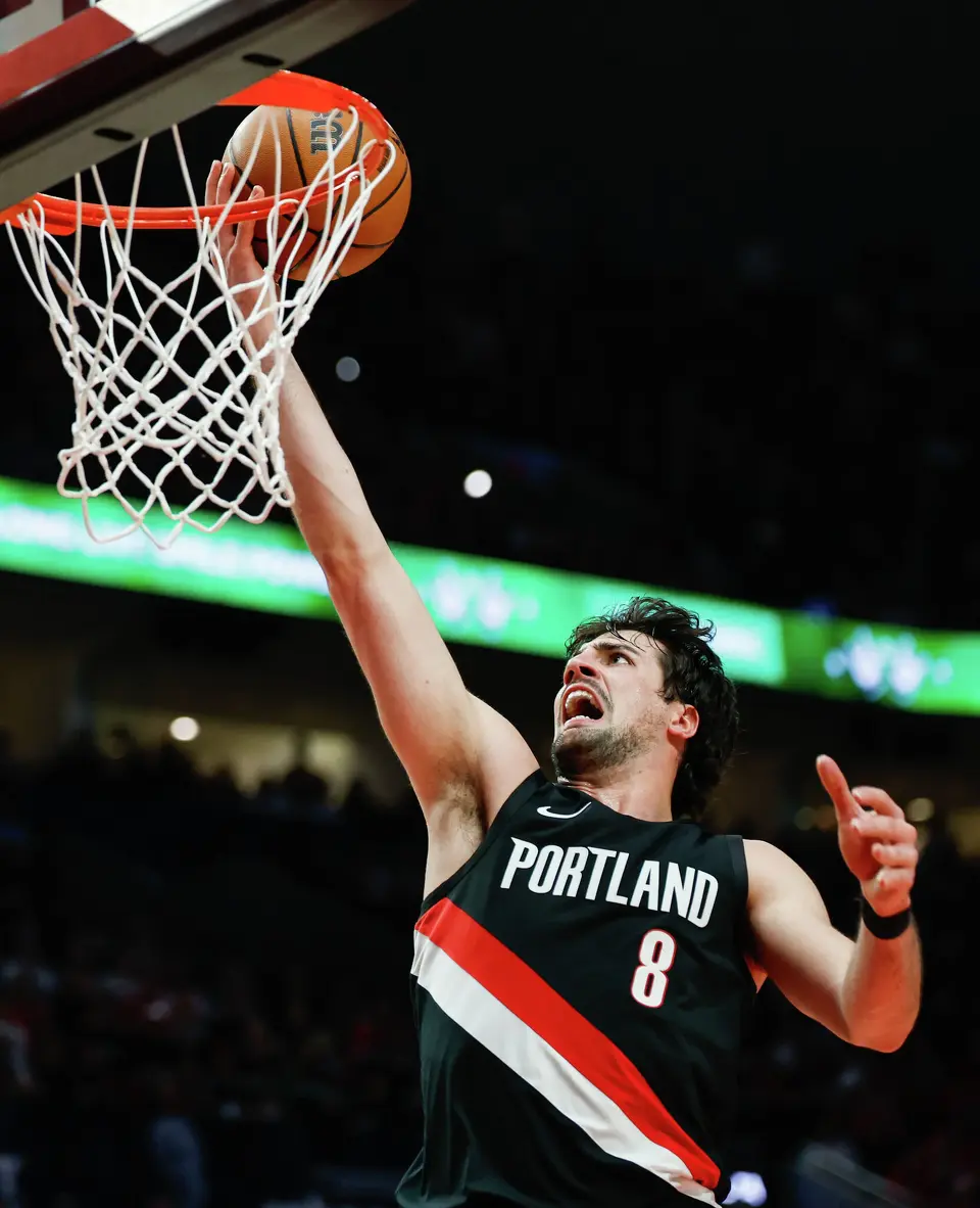 Portland Trail Blazers forward Deni Avdija (8) lays the ball in during the third quarter of Game 4 of a first-round NBA playoff series against the Portland Trail Blazers at Moda Center on Sunday, April 26, 2026.