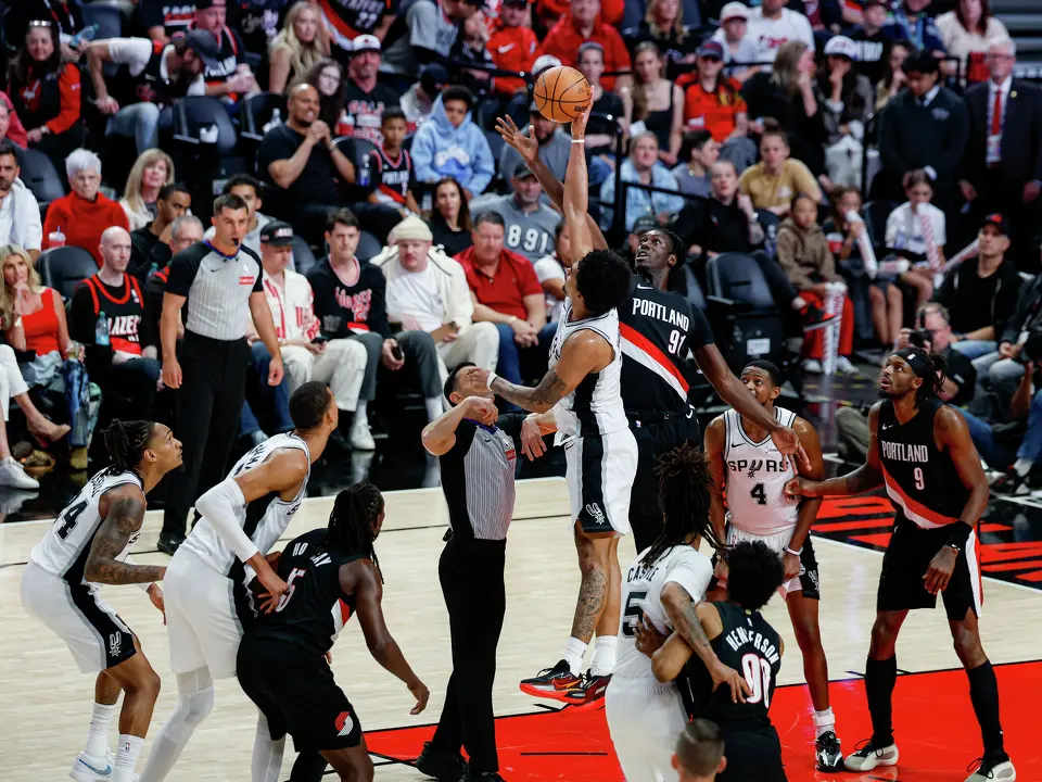 San Antonio Spurs guard Dylan Harper (2) wins a jump ball over Portland Trail Blazers guard Sidy Cissoko (91) during the fourth quarter of Game 4 of a first-round NBA playoff series at Moda Center on Sunday, April 26, 2026. The Spurs won 114-93, leading the series 3-1.