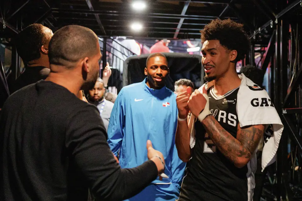 San Antonio Spurs guard Dylan Harper (2) is greeted with cheers as he heads back to the locker room after Game 3 of a first-round NBA playoff series against the Portland Trail Blazers at Moda Center in Portland, Saturday, April 25, 2026. The Spurs defeated the Trail Blazers 120-108 to lead the series 2-1.