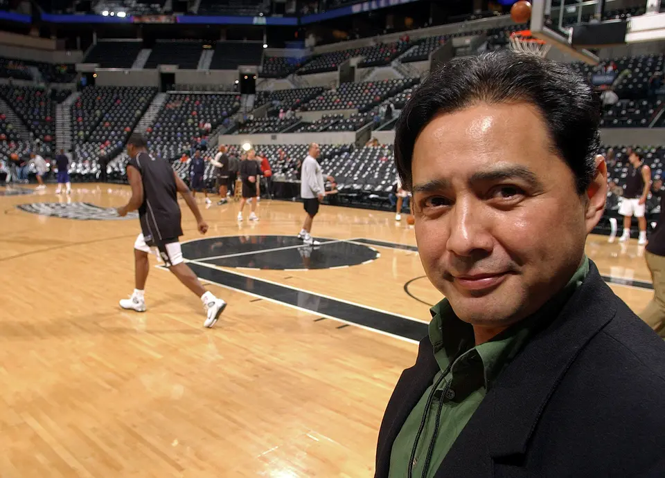Spurs' Spanish broadcaster Paul Castro prior to the game with the Mavericks Friday Jan. 14, 2005, at the SBC Center. The Spurs went on to win 98-95. PHOTO BY EDWARD A. ORNELAS/STAFF