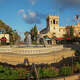 The Plaza de Panama fountain and the Ornate Facade of Casa del Prado in Balboa Park, San Diego, Calif.