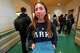 Ava Khouri, a Hanover High School senior who has trained middle school students to take initiatives to stop harmful behavior, poses in a hallway Wednesday, March 25, 2026, in Hanover, Mass.