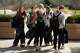 Students enjoy a light moment outside Hanover High School, Wednesday, March 25, 2026, in Hanover, Mass.