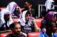 FILE - Al Ain's Hazim Abbas, center, shields himself from the sun with other players before the Club World Cup Group G soccer match between Wydad AC and Al Ain FC in Washington, June 26, 2025.