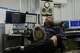 Matthew Douglas, the observatory's chief weather observer, holds a psychrometric calculator while in his office at the Blue Hill Observatory and Science Center, Friday, March 13, 2026, in Milton, Mass. (Laura Martin Agudelo/MIT Graduate Program in Science Writing via AP)