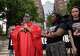Audrey Jones, mother of James Broadnax, a death row inmate scheduled to be executed on April 30, speaks during an interfaith prayer circle held for her husband, outside of the Frank Crowley Courts Building in Dallas, TX, Tuesday, April 21, 2026. Tiara Cooper (center), with In Defense of Black Lives Dallas, and Tiana Broadnax, James Broadnax’s wife, listen.