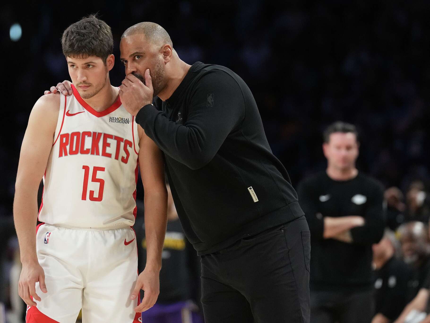 Houston Rockets Head Coach Ime Udoka talks with Houston Rockets guard Reed Sheppard (15) during Game 5 of a first-round NBA playoff basketball series against the Los Angeles Lakers at Cyrpto.com Arena in Los Angeles on Wednesday, April 29, 2026. Houston Rockets won the game 99-93 and will head back to Houston for Game 6.