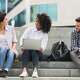Teen students talking on steps. The National Council for Mental Wellbeing says if teens show signs of mental health challenges, friends may be the first to help.