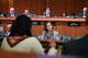 State Sen. Patricia Fahy, center, listens to testimony from Albany Mayor Dorcy Applyrs, left, during a budget hearing this session. Fahy has proposed an opt-in luxury second-home tax outside of New York City.