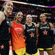 Former UConn Huskies players Breanna Stewart #30 of the New York Liberty, Gabby Williams #5 of the Seattle Storm, Paige Bueckers #5 of the Dallas Wings and Napheesa Collier #24 of the Minnesota Lynx pose during the 2025 AT&T WNBA All-Star Game at Gainbridge Fieldhouse on July 19, 2025 in Indianapolis, Indiana.