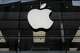 FILE - The Apple logo is illuminated at a store in Munich, Germany, April 2, 2026.