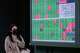 A person walks in front of an electronic stock board showing Japan's Nikkei index at a securities firm Thursday, April 30, 2026, in Tokyo.