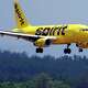 FILE - A Spirit Airlines 319 Airbus approaches Manchester Boston Regional Airport for a landing, June 2, 2023, in Manchester, N.H.
