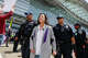 Police arrest San Francisco Supervisor Connie Chan as she and other demonstrators block the road in front of San Francisco International Airport’s international terminal Friday during May Day protests.