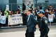 State Sen. Josh Becker, D-Menlo Park, is arrested during Friday’s May Day demonstration at SFO.