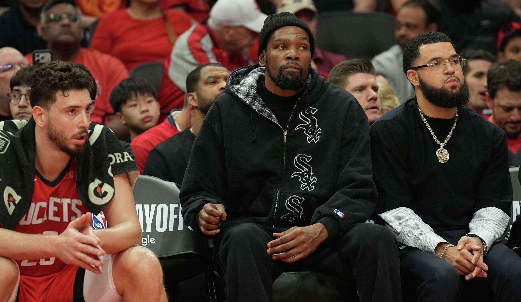 Houston Rockets center Alperen Sengun (28) from left, Kevin Durant , and Fred Vanvleet watch Game 6 of a first-round NBA playoff basketball series against the Los Angeles Lakers at Toyota Center in Houston on Friday, May 1, 2026.
