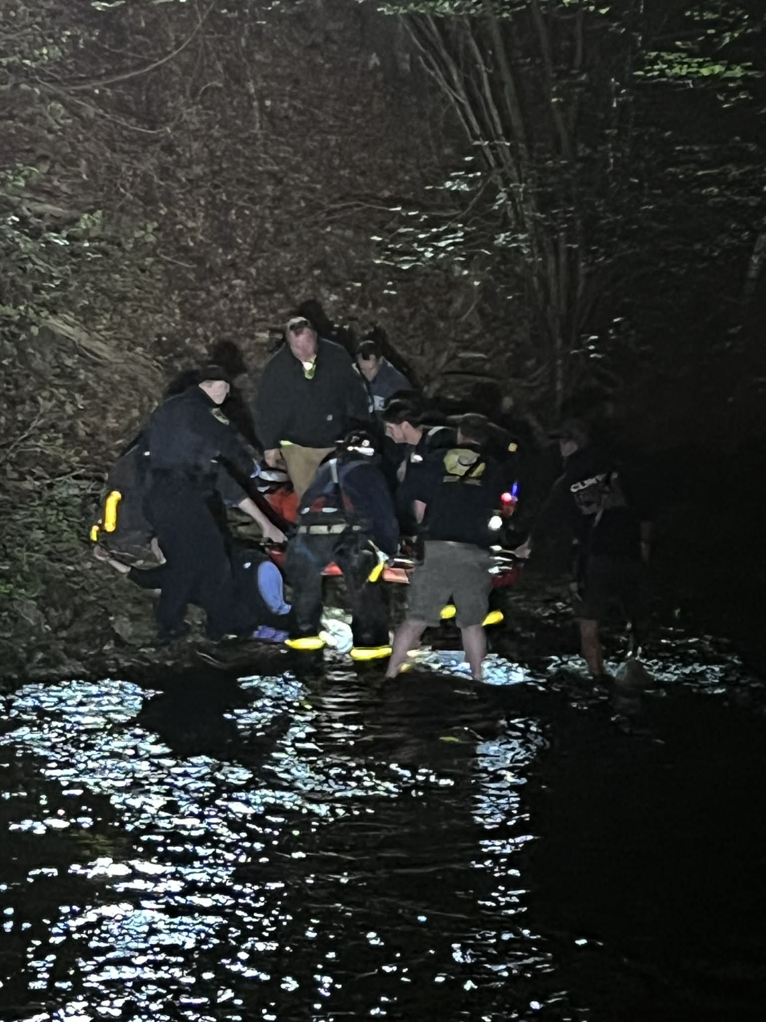 Person rescued after fall down embankment near river in Clinton, officials say