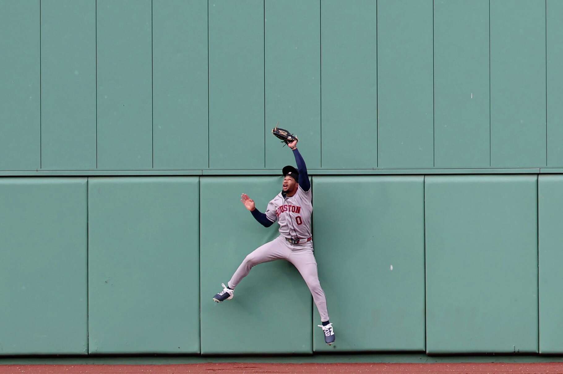 Houston Astros center fielder Brice Matthews catches the ball on a sacrifice fly hit by Boston Red Sox's Willson Contreras during the fifth inning of a baseball game, Saturday, May 2, 2026, in Boston. (AP Photo/Mark Stockwell)