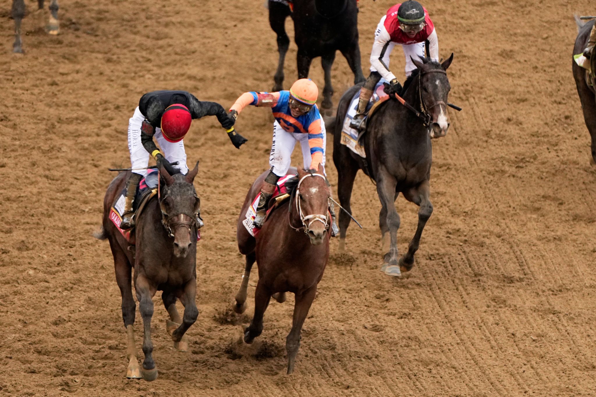 Jockey Jose Ortiz comes from last to pass brother Irad and win Kentucky Derby
