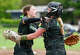 New Milford pitcher Lia Manka (9) celebrates their win over St. Paul with catcher Lillian Fortier (48) Saturday May 2, 2026 a St. Paul Catholic School in Bristol.