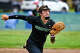 New Milford’s Lydia Rocky (19) delivers a pitch during their game against St. Paul Saturday May 2, 2026 a St. Paul Catholic School in Bristol.