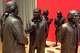 FILE - Life-size bronze sculptures of the signers of the U.S. Constitution stand in the Signers' Hall on July 7, 2016, at the National Constitution Center in Philadelphia.