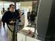 An attendee plays the Guitar Hero emulator at ACL Fest's "Rewind to Reveal" event at UMLAUF Sculpture Garden on May 2, 2026 in Austin