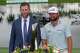 Cameron Young, right, stands with Eric Trump as he poses with the trophy after winning the Cadillac Championship PGA golf tournament Sunday, May 3, 2026, in Doral, Fla.