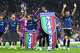 Inter players celebrate the victory of their 21st championship after a Serie A soccer match between Inter Milan and Parma, in Milan, Italy, Sunday, May 3, 2026.