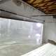 Hurricane breaking through a garage door. Insurance Institute for Business & Home Safety (IBHS) has a Hurricane Ready Guide.