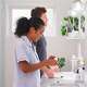 Couple brushing their teeth.Tom's of Maine makes products free from artificial flavors, colors and sweeteners.