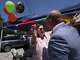 U.S. Rep. Julie Johnson gives a congratulatory hug to Randall Bryant, chair of the DART Board of Directors, after the outcome of elections by cities to remain members of the transit agency. The two attended a community event in West Dallas.