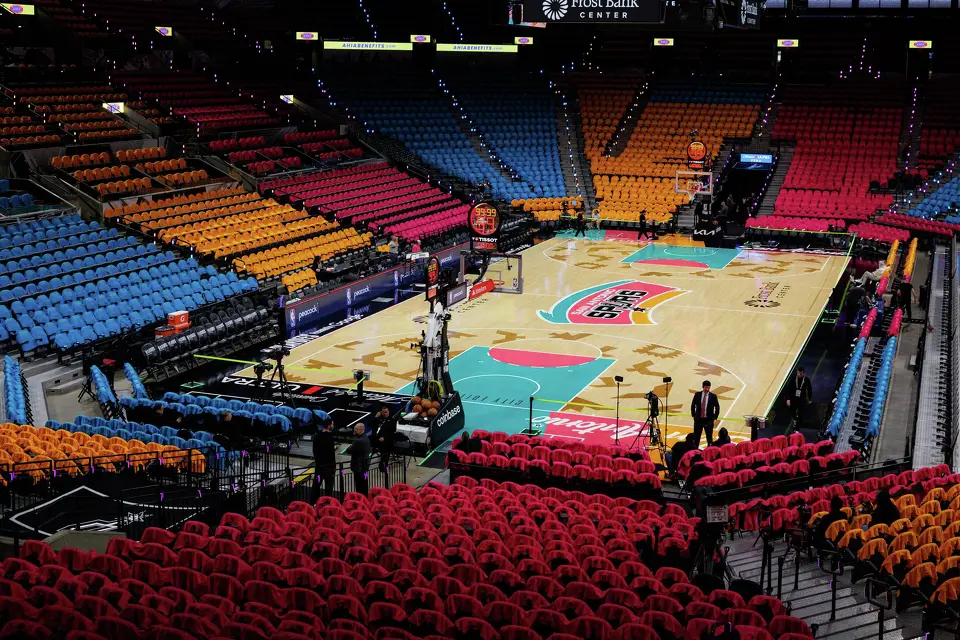 Fiesta-themed T-shirts are laid out on seats for fans before Game 1 of the Western Conference semifinals between the San Antonio Spurs and the Minnesota Timberwolves at Frost Bank Center in San Antonio on Monday, May 4, 2026.
