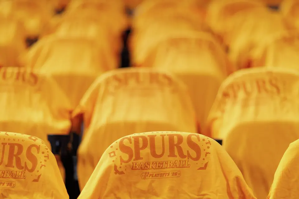 Fiesta-themed T-shirts are laid out on seats for fans before Game 1 of the Western Conference semifinals between the San Antonio Spurs and the Minnesota Timberwolves at Frost Bank Center in San Antonio on Monday, May 4, 2026.