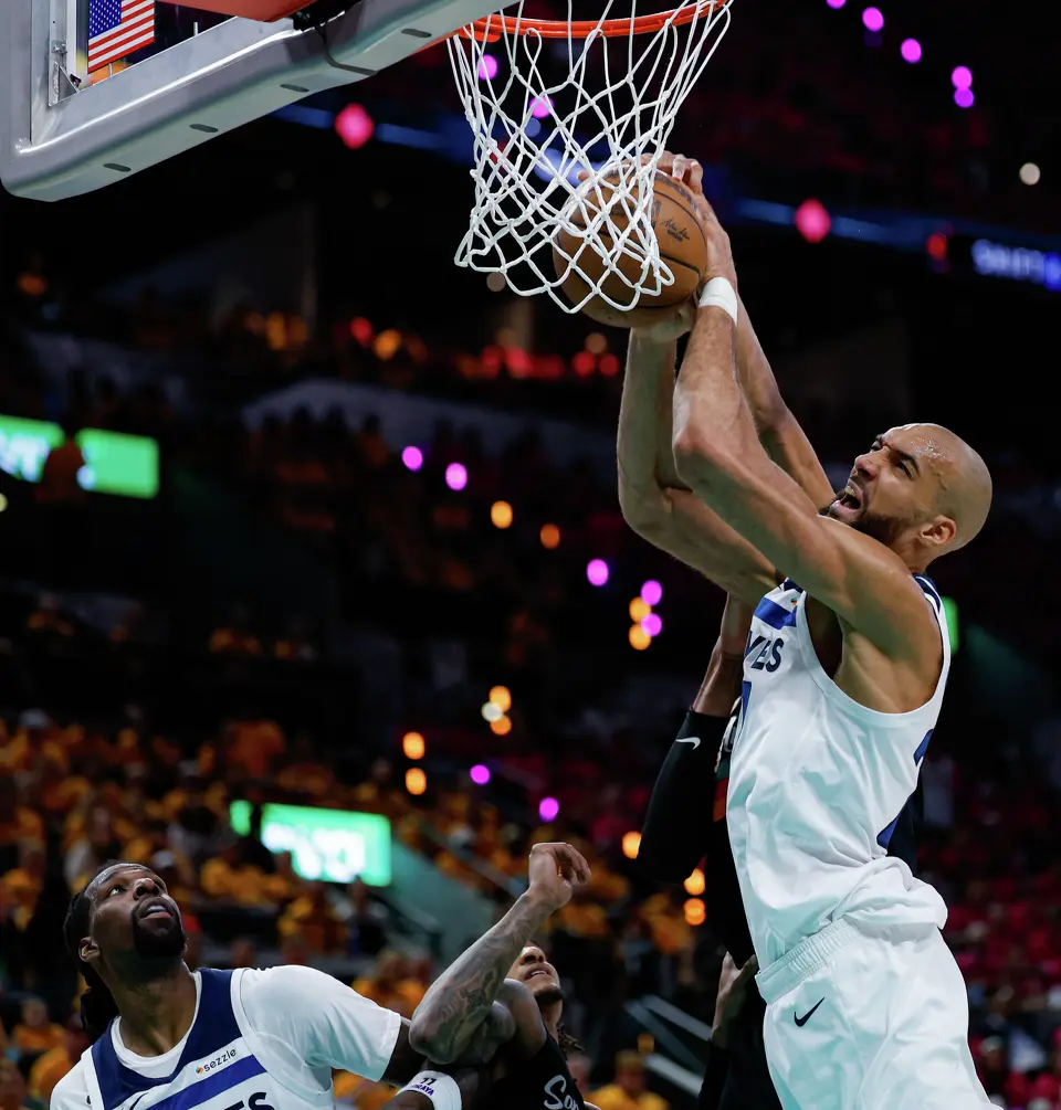 San Antonio Spurs forward Victor Wembanyama (1) stops Minnesota Timberwolves center Rudy Gobert (27) under the net during the first half of Game 1 of the Western Conference semifinals at Frost Bank Center in San Antonio, Monday, May 4, 2026.