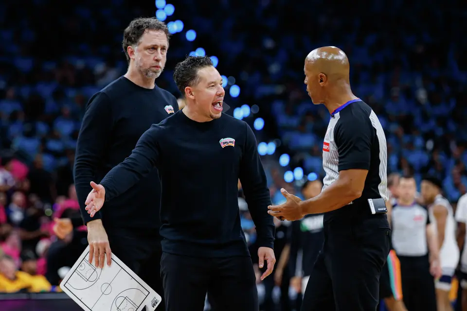 San Antonio Spurs head coach Mitch Johnson talks to referee Marc Davis (8) during a timeout in fourth quarter of the Western Conference semifinals against the Minnesota Timberwolves at Frost Bank Center in San Antonio, Monday, May 4, 2026. The Spurs fell 104-102 to the Timberwolves.