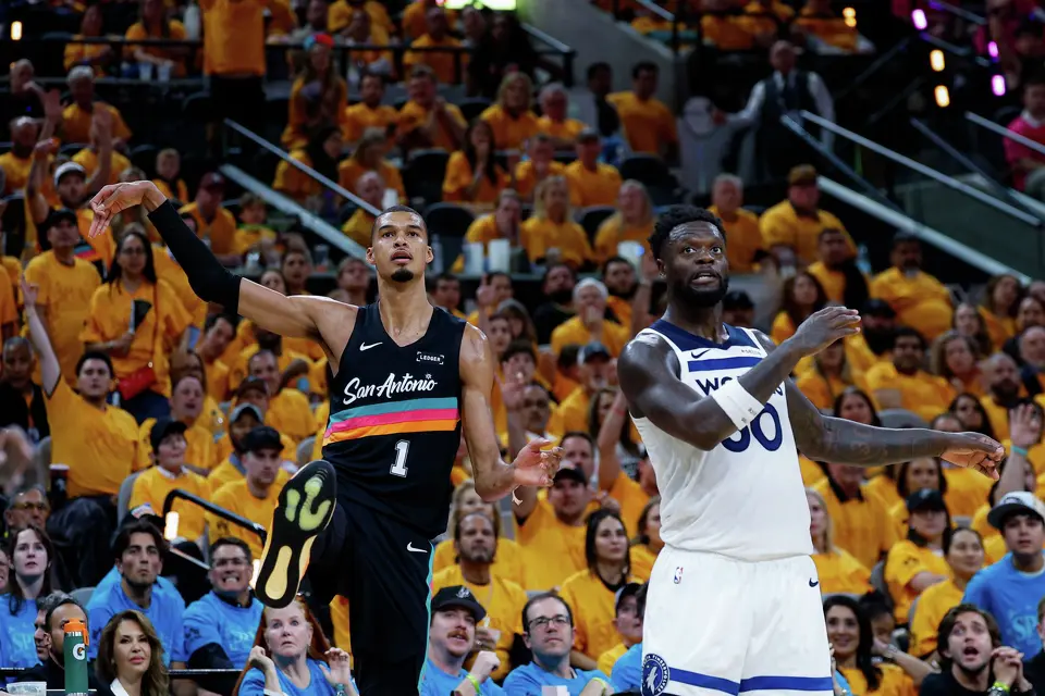 San Antonio Spurs forward Victor Wembanyama (1) and Minnesota Timberwolves forward Julius Randle (30) watch Wembanyama’s shot miss the basket during the second half of Game 1 of the Western Conference semifinals at Frost Bank Center in San Antonio, Monday, May 4, 2026. The Spurs fell 104-102 to the Timberwolves.